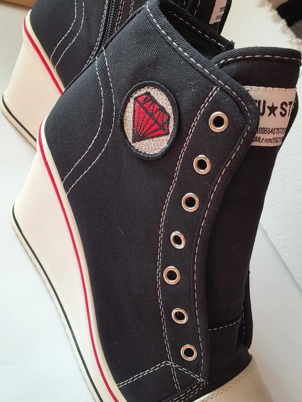 High-Top Wedge Ankle Boots in Black and White by
